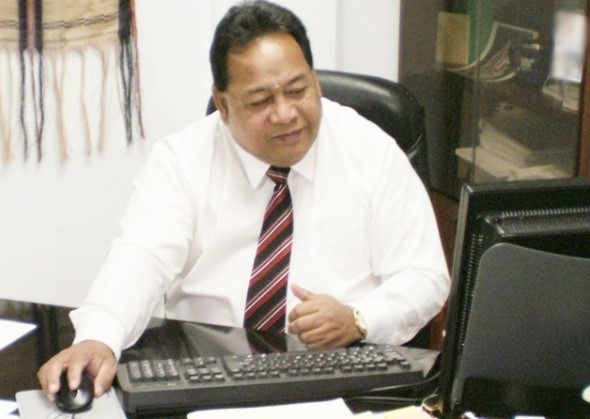 photo of gentleman working on a computer